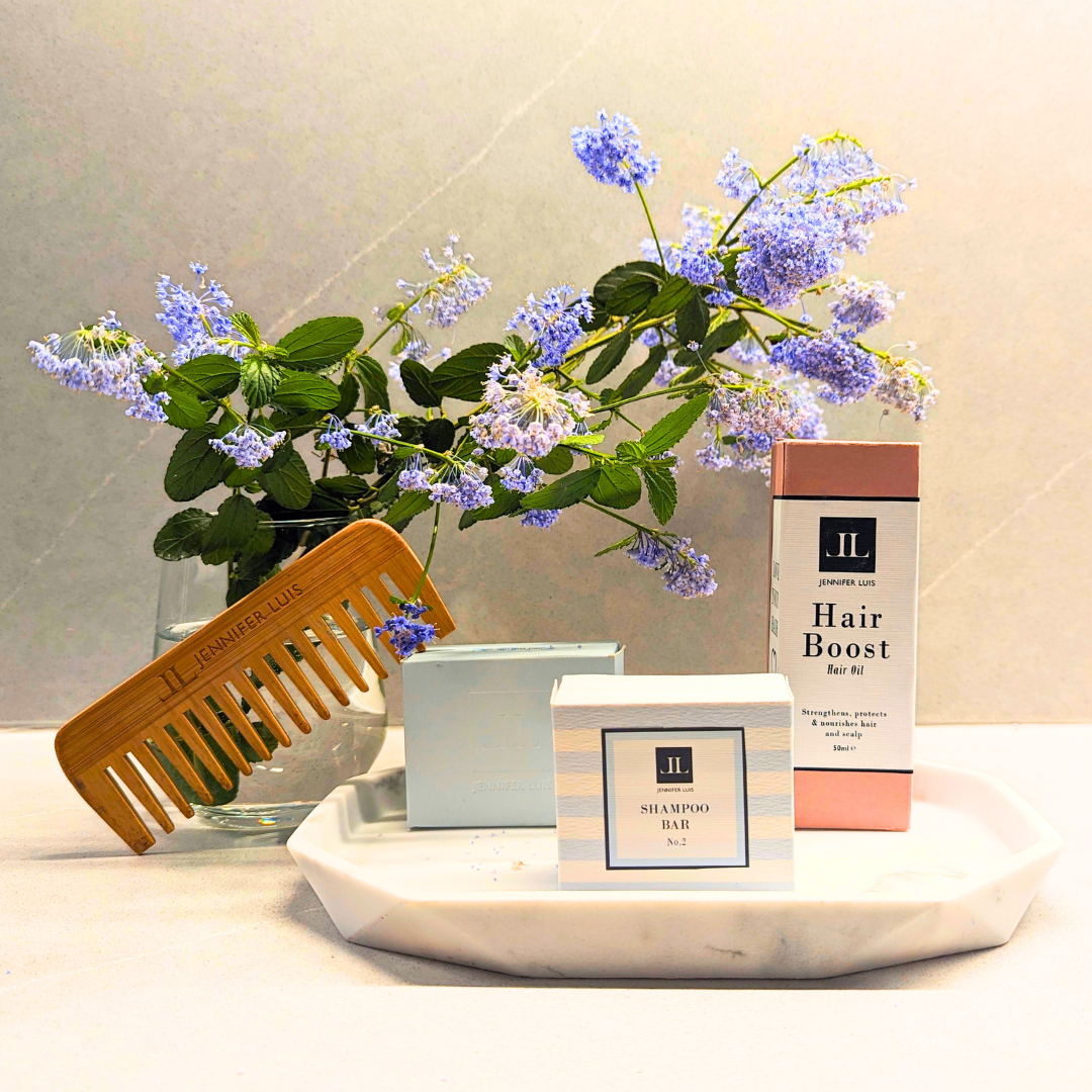 Shampoo bar to improve the health of hair. Hair Boost hair oul to improve health of the hair and scalp. bamoo comb and flowers